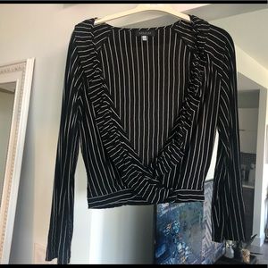 Abbeline black blouse with white stripes.
